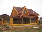 Отделка бревенчатого дома с терассой в Серпуховском районе.
