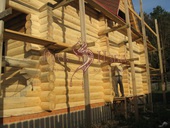 Шлифовка и подготовка внешней стены дома из бревна к покраске в Серпухове